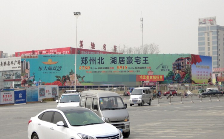 郑州市花园路三全路交叉口西南角墙体围挡广告